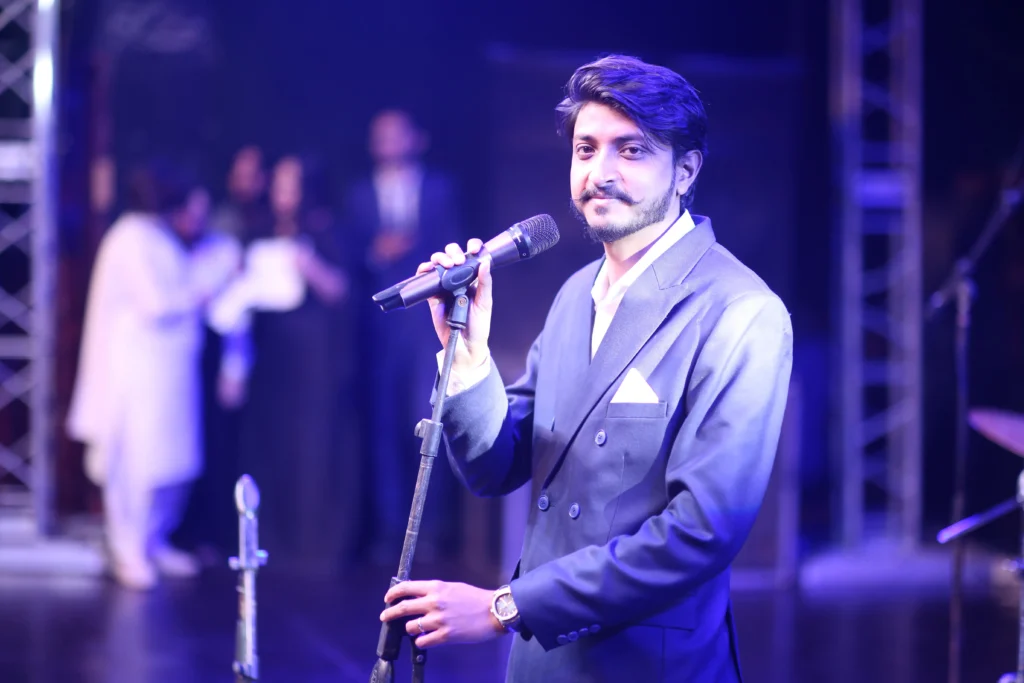 associate singing at touchstone annual event